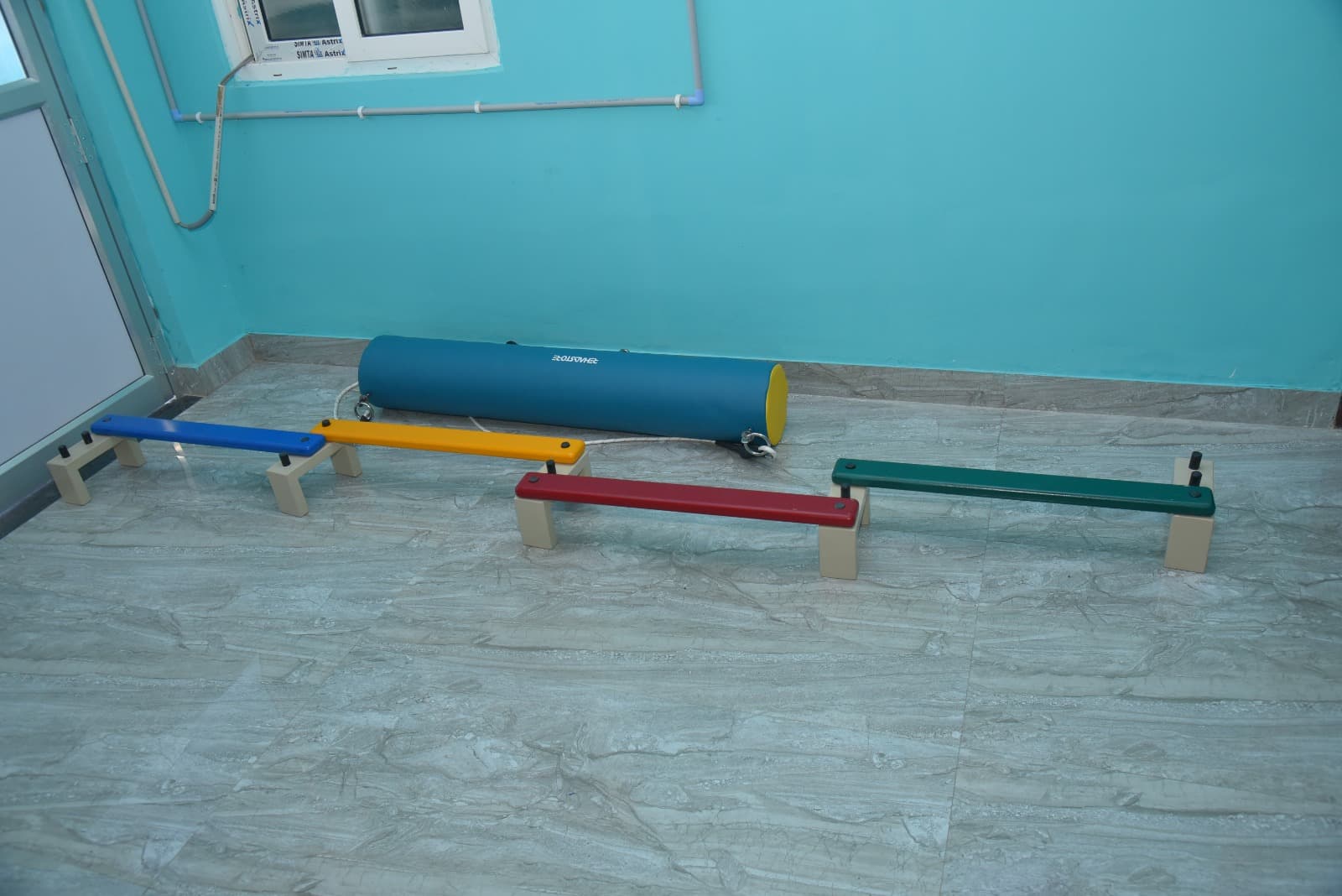 Suspended bolster swing for vestibular therapy