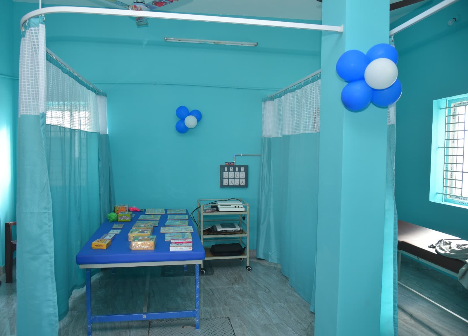Occupational therapy sensory gym with slide and foam climbing steps